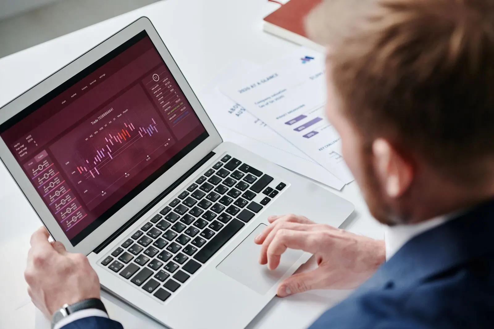 Business owner reviewing an analytics dashboard on a laptop