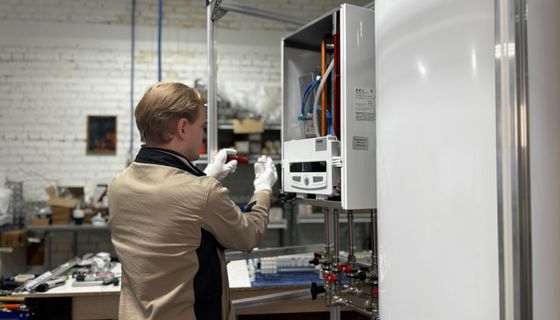 Heating Engineer at work — the kind of business we build websites for