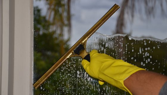 Window Cleaner at work — the kind of business we build websites for